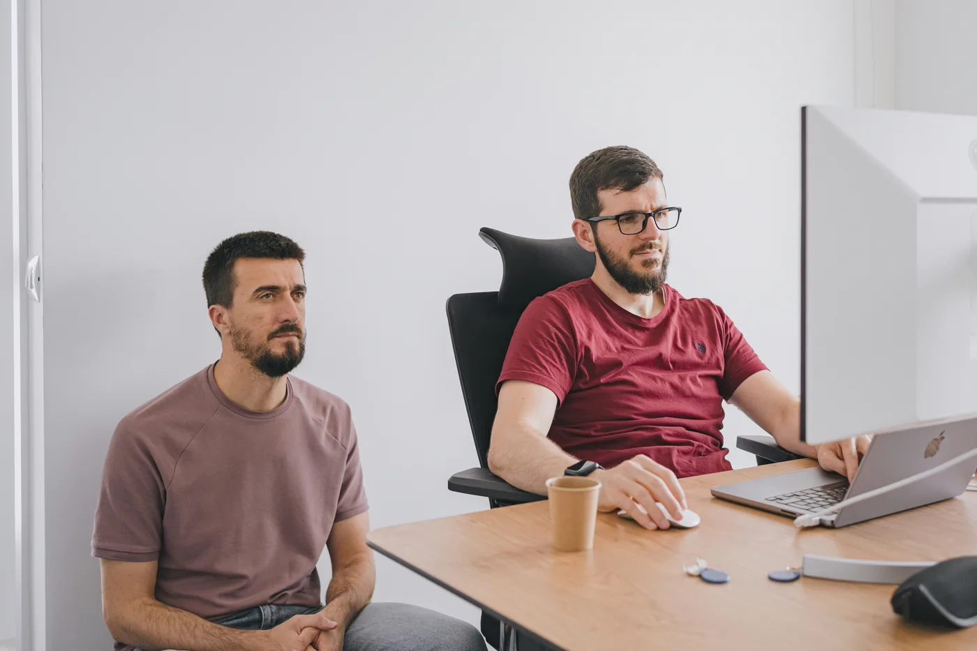 Two developers collaborating on a custom Shopify integration build
