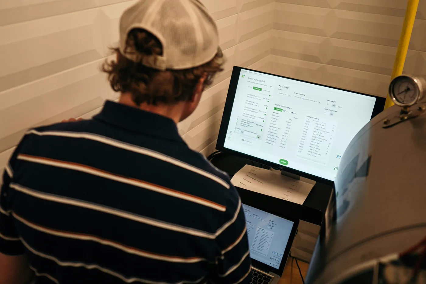 Operations lead reviewing a Shopify Flow automation build on a monitor