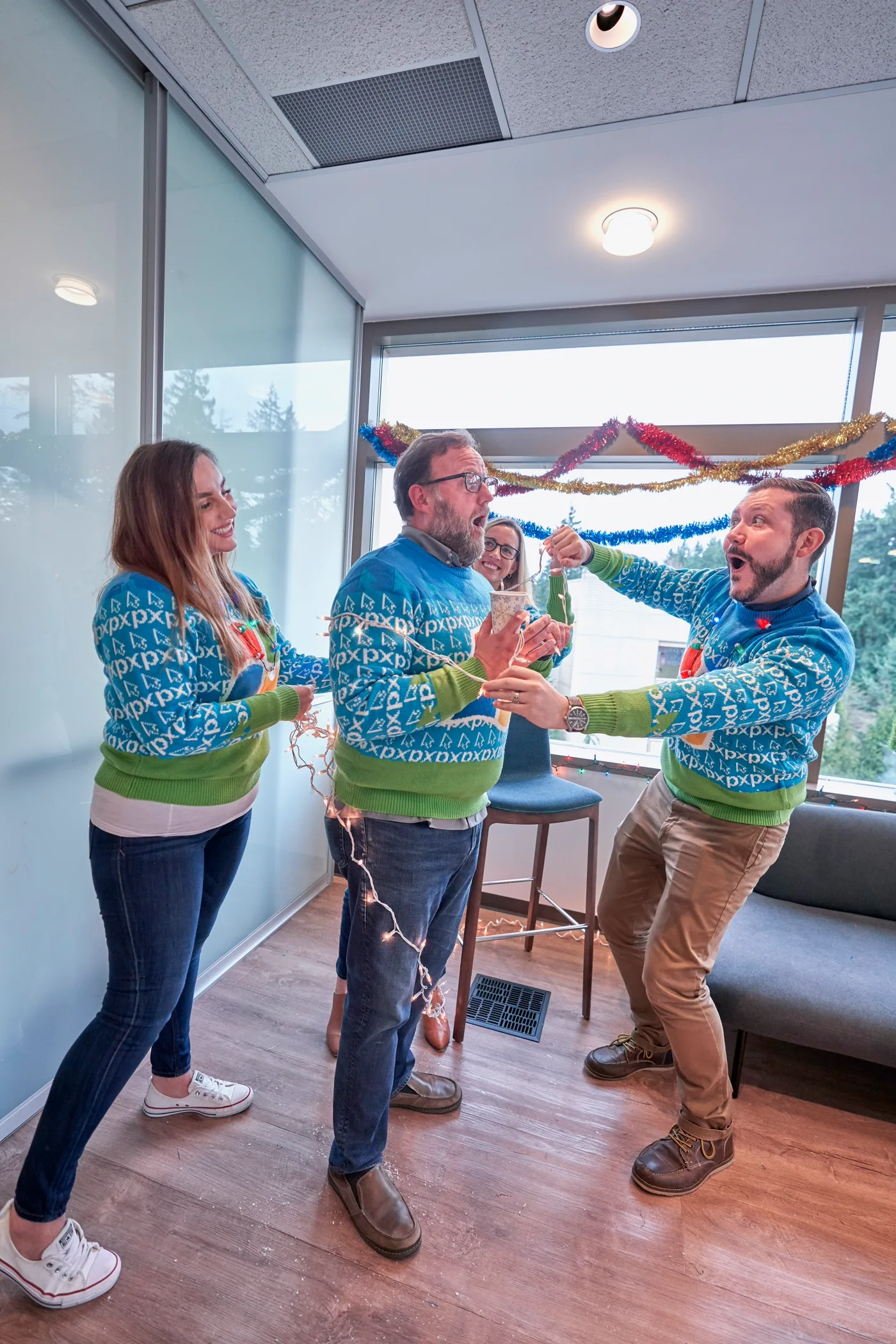 Team celebrating a successful automation launch inside a modern office