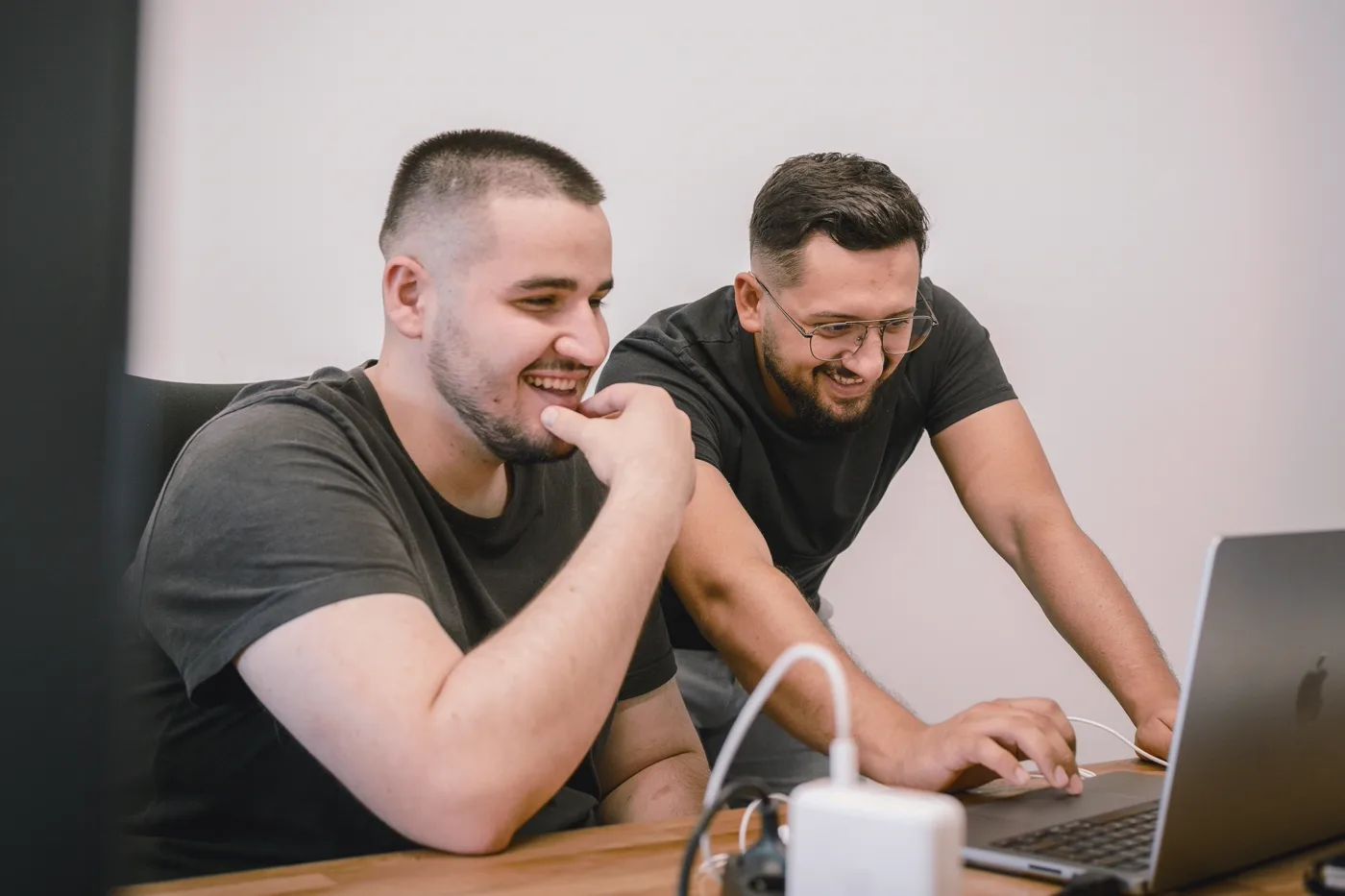 Two developers reviewing a web application build together