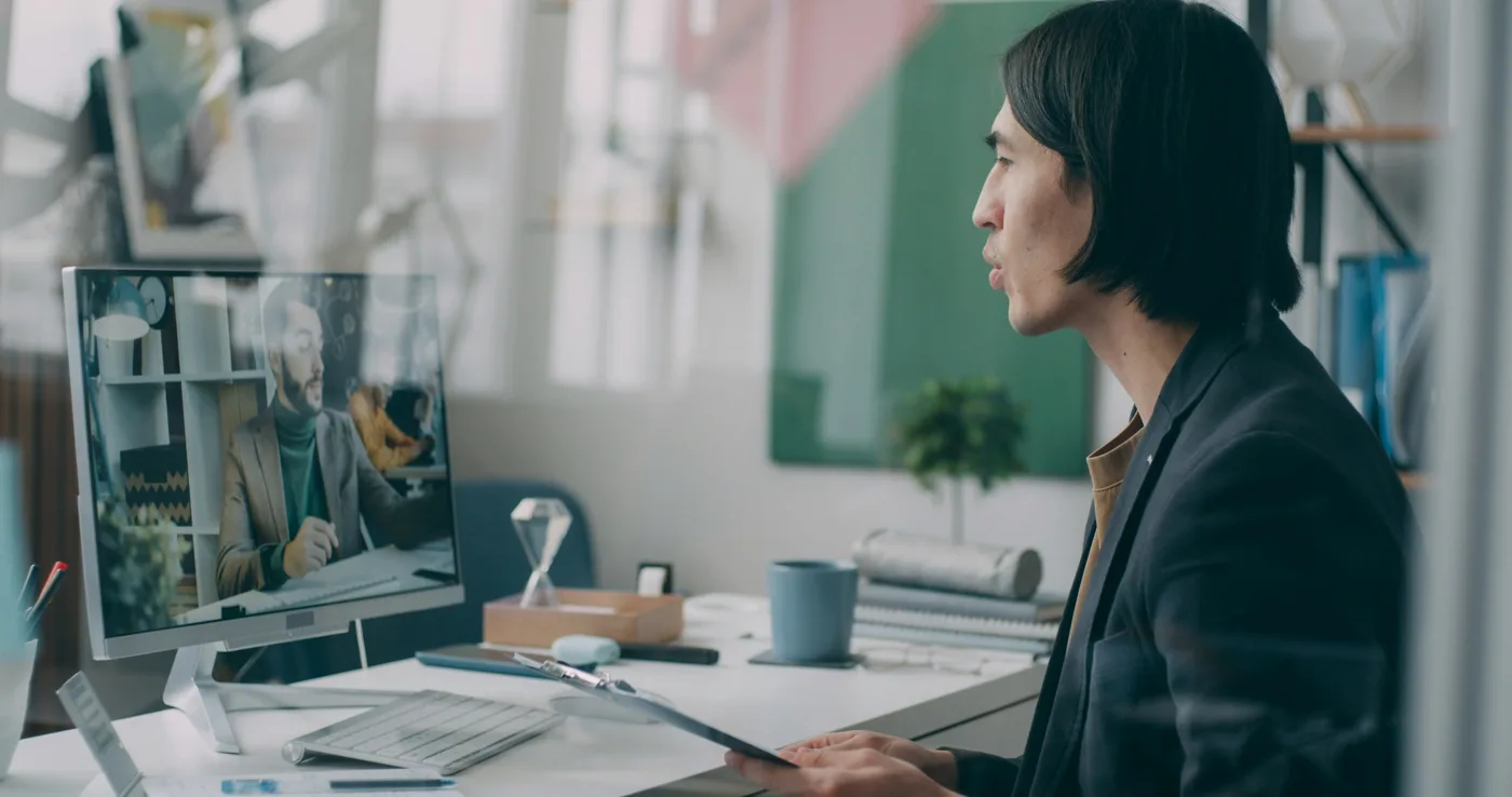 Clean modern dual-monitor workspace for thumbnail and packaging design
